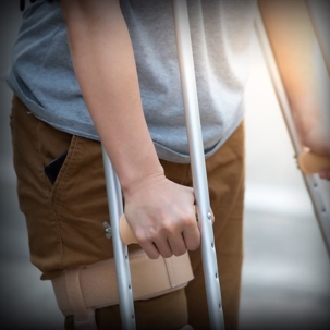 person on crutches