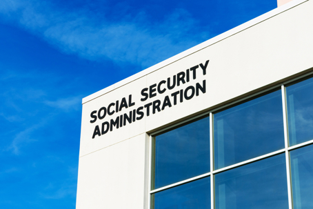 Social Security Administration sign on field office building.