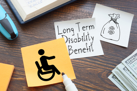 Long Term Disability Benefit is shown on a business photo using the text